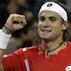 Ferrer se impone a la lluvia