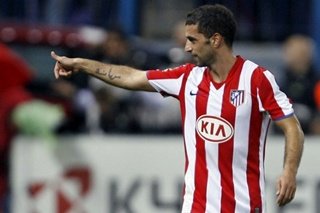 El Atlético cumple y el Sevilla cae